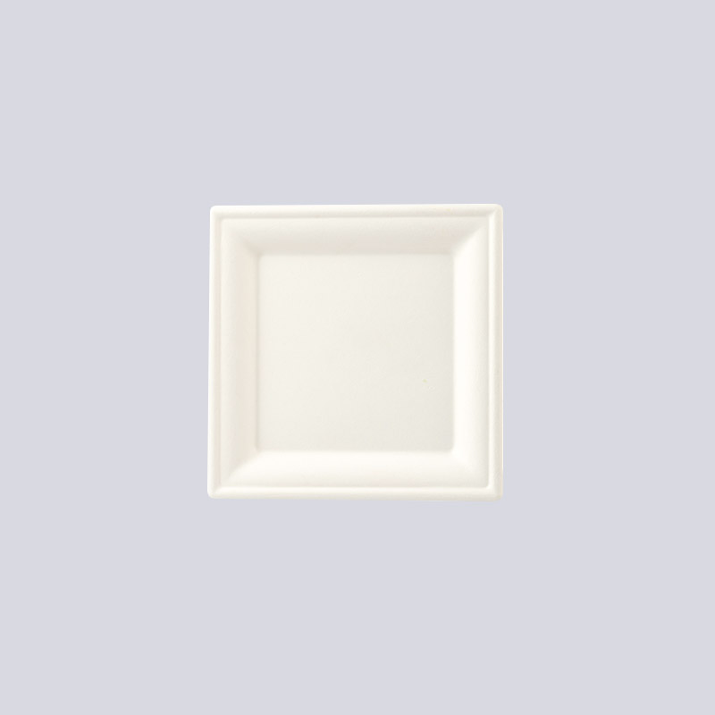 Lisovaná vláknitá deska a podnos na šálky